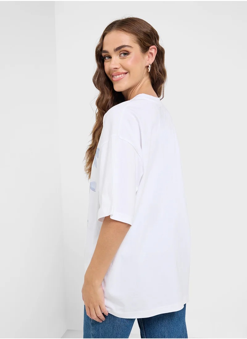 جينجر Oversize Bow Detail Graphic T-Shirt