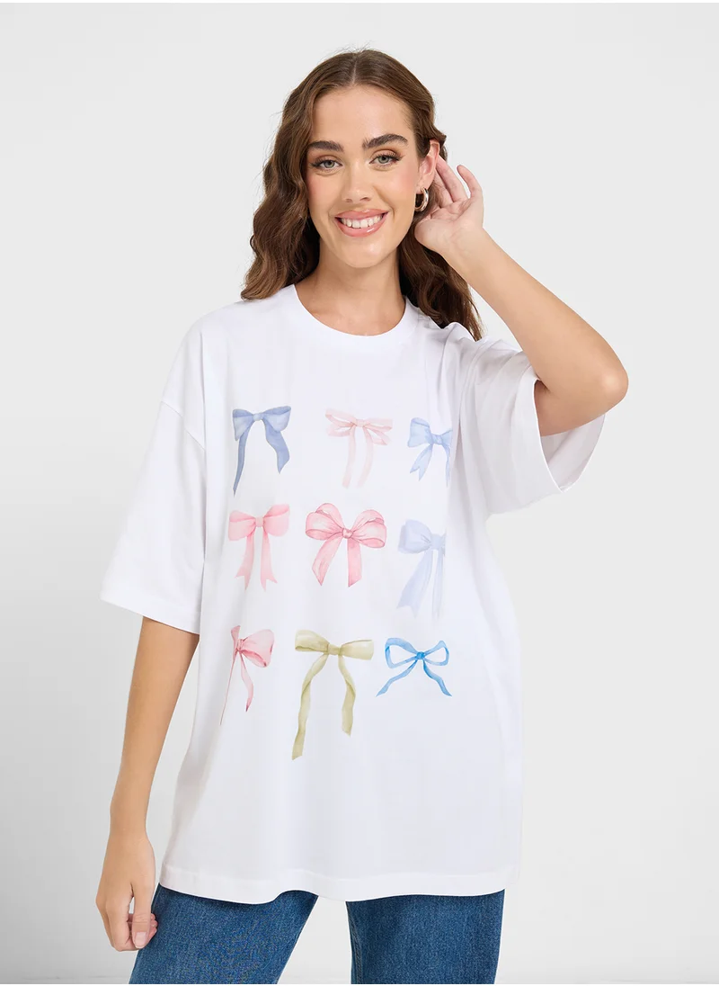 جينجر Oversize Bow Detail Graphic T-Shirt
