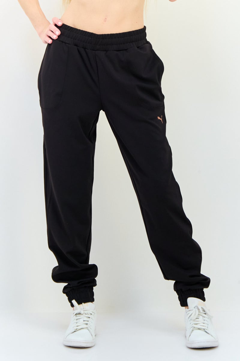 PUMA Women Sportswear Fit Brand Logo Training Sweatpants, Black - Image 1