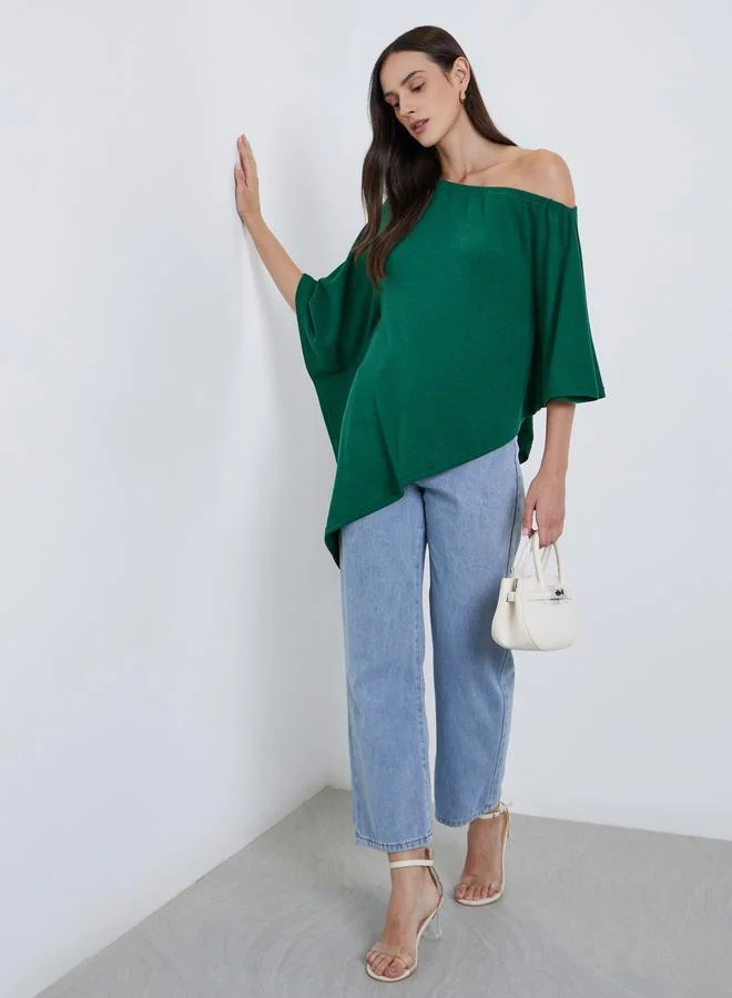 ستايلي بلوزة سادة بتفاصيل كتف واحد