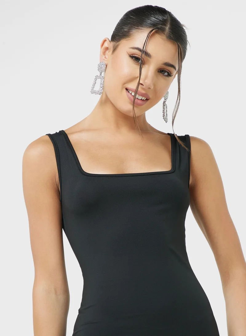 جينجر فستان بتفاصيل كشكش من Bodycon
