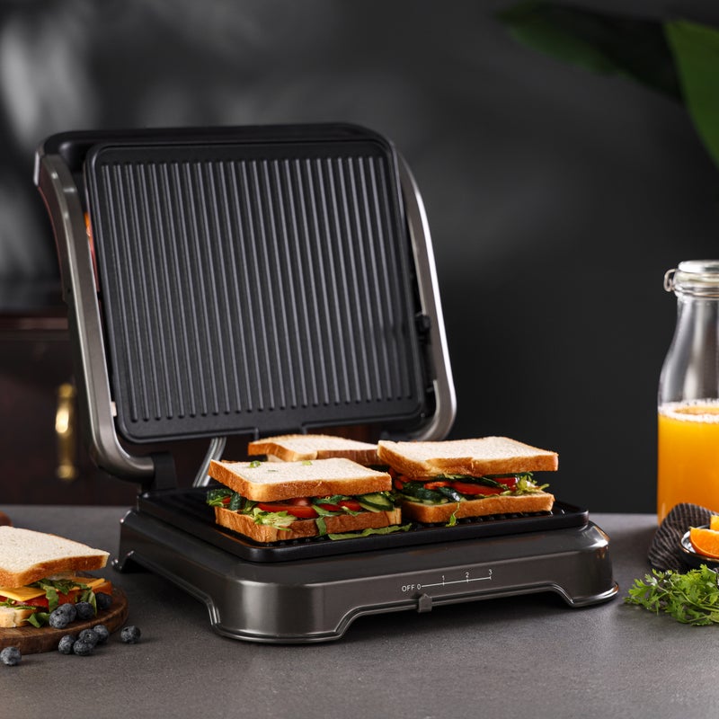 Geepas 2000 W Grill Maker- GGM36539/ Fixed Die Cast Plates, Non-Stick for Easy Release and Quick Cleanup and Heat Up/ Cool Touch Handle, Perfect for Grilled Sandwiches, BBQ Design, Fit Any Type or Size of Food, Meat, Snack/ Black and Silver, 2 Years Warranty 4 Slices 2000 W GGM36539 BLACK AND SILVER - Image 5