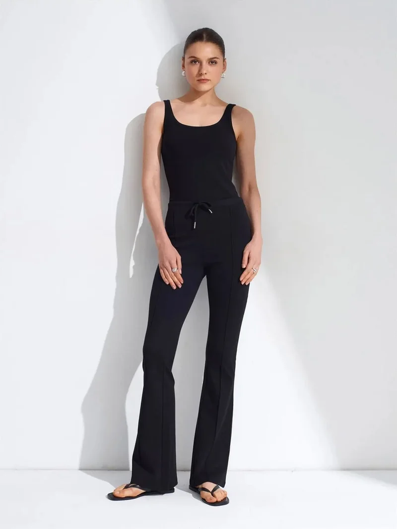 ديلفين DILVIN Mid-Waist Flare Jersey Pants With Drawstring