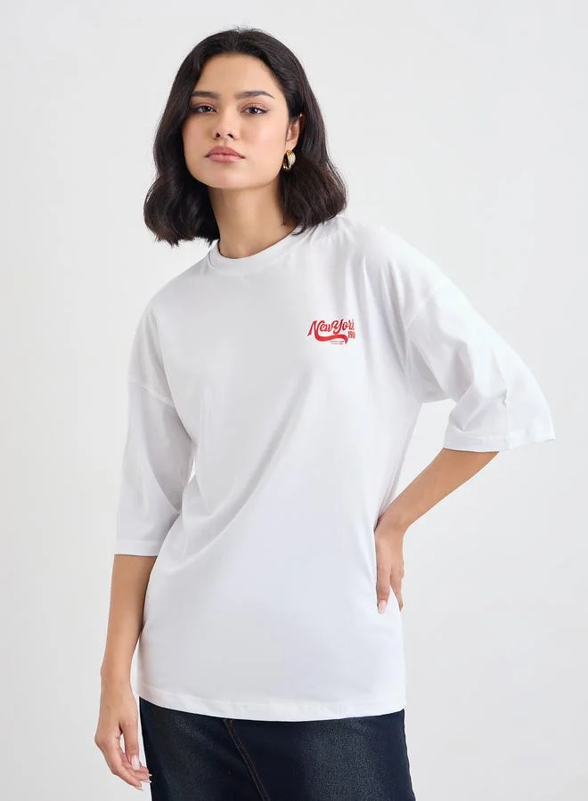 Styli Women White Slogan Print Short Sleeve Oversized T-Shirt