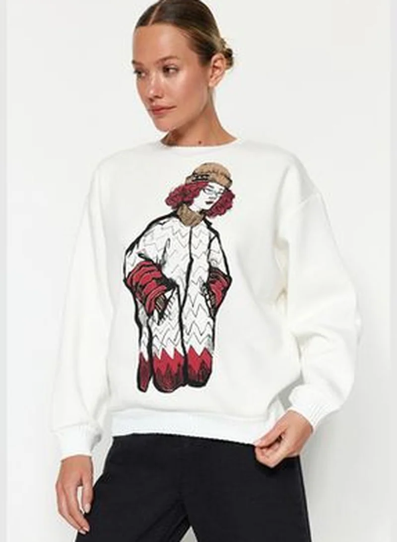 trendyol Ecru Regular/Regular Pattern Printed Sweater Detailed Knitted Sweatshirt with Fleece Inside TWOAW24SW00220.