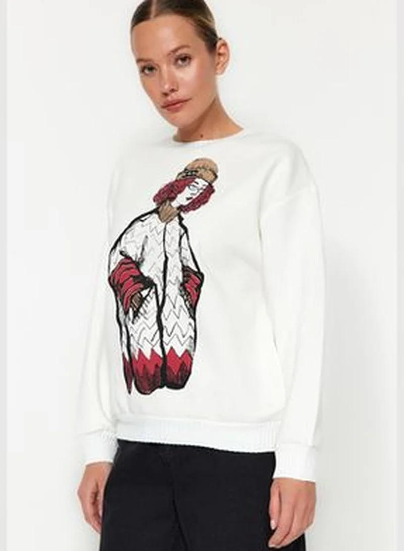trendyol Ecru Regular/Regular Pattern Printed Sweater Detailed Knitted Sweatshirt with Fleece Inside TWOAW24SW00220.