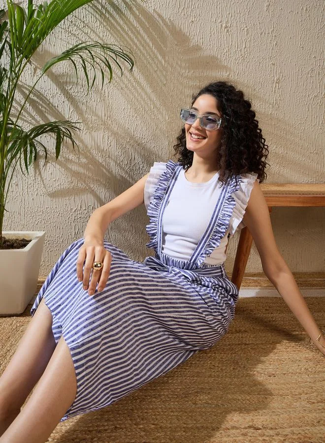 ستايل ستون جمبسوت مخططة بتفاصيل حمالات مزينة بكشكش