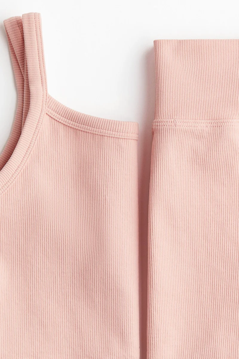 اتش اند ام طقم رياضي بدون درزات من نسيج دراي موف - قطعتين