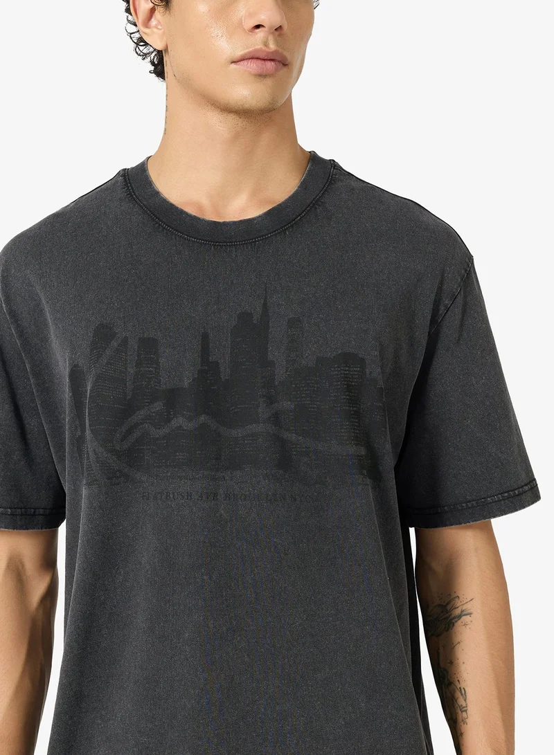 Karl Kani  Signature Skyline Washed Boxy T-Shirt for Men | Best Price UAE