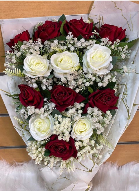 A bouquet of red and white flowers suitable for weddings and birthdays