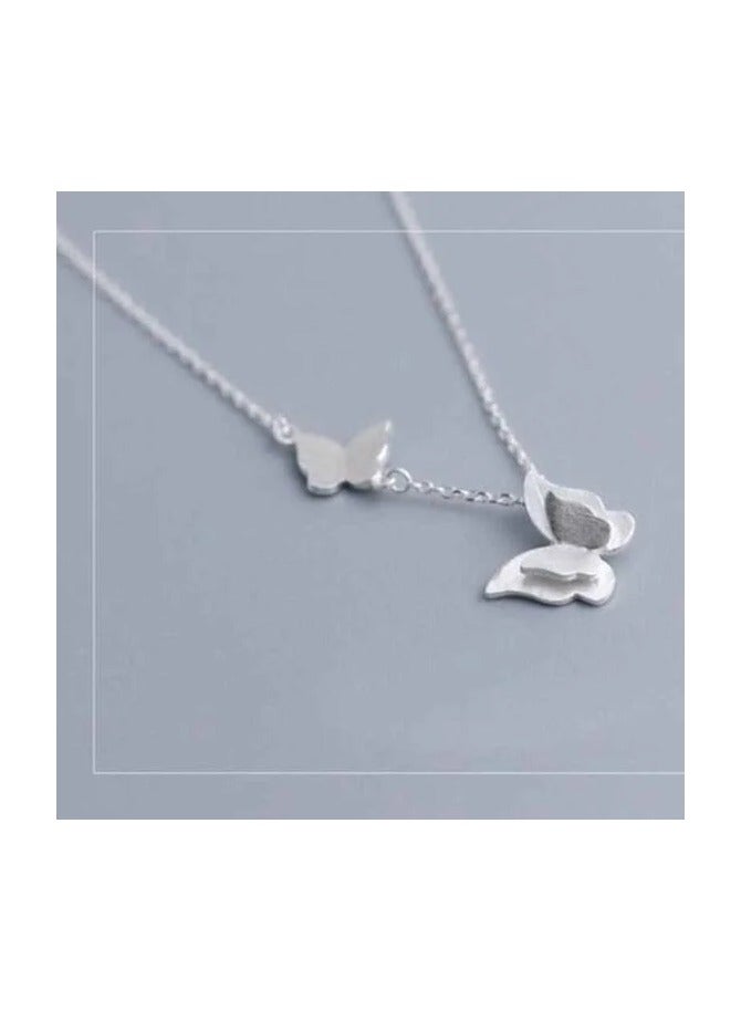 "Enchanting Transformation: The Butterfly Necklace in Silver 925 - A Beautifully Crafted Symbol of Change and Freedom, Expertly Designed to Add a Touch of Whimsical Elegance to Your Jewelry Collection, Perfect for Celebrating New Beginnings and Personal Growth." - Image 1