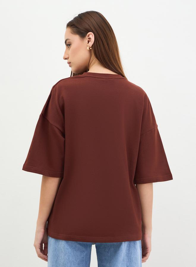 Styli Women Oversized Brown Slogan Print T-Shirt - Image 5