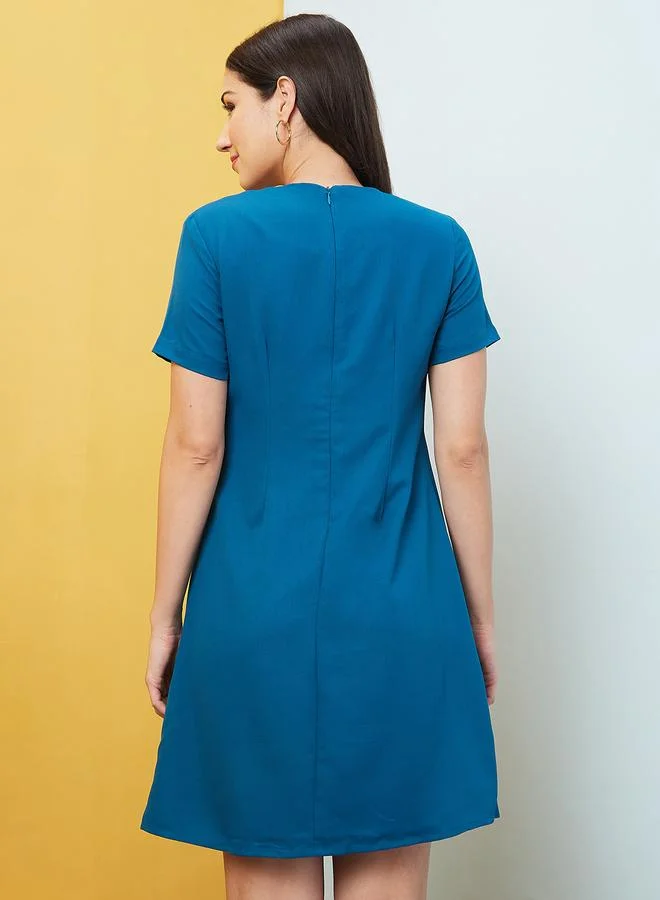 globus  Globus Women Solid Round Neck A-Line Mini Dress with Pleated Waist for Women | Best Price UAE