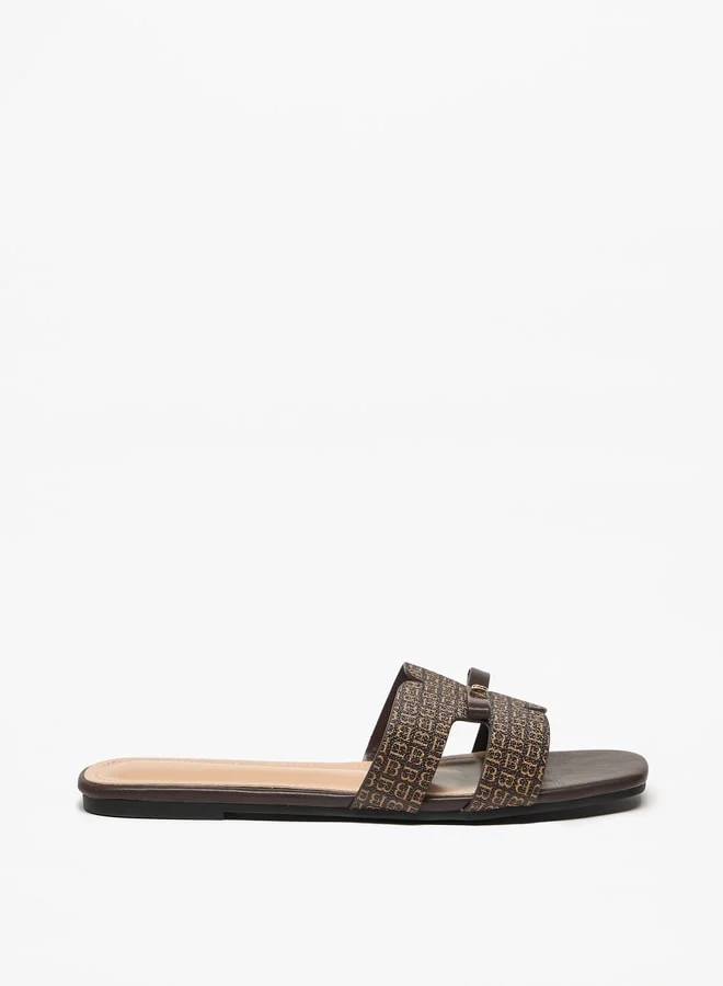 Flora Bella By Shoexpress Monogram Print Slip-On Sandals with Bow Applique