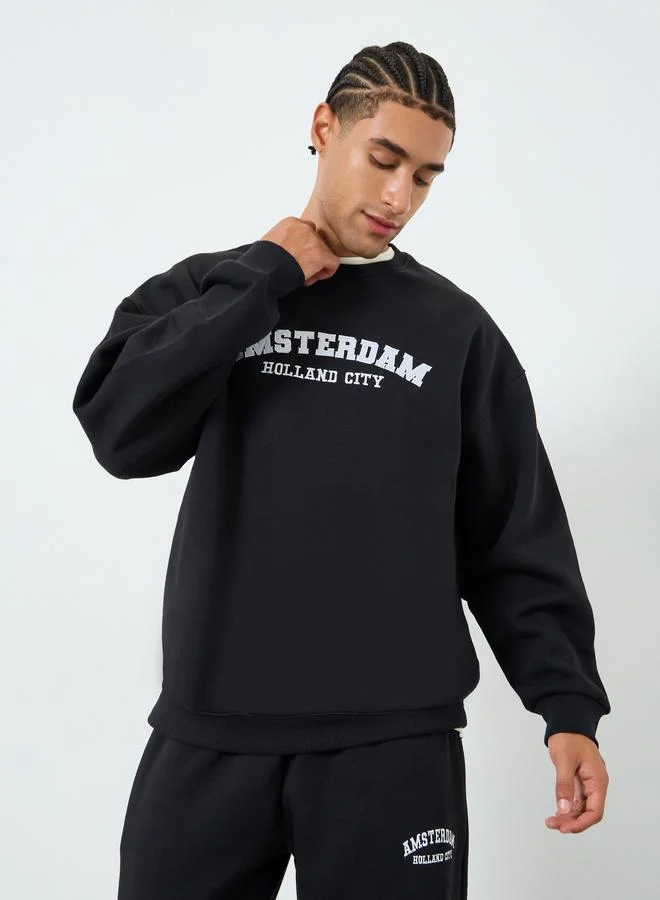 Styli Men Boxy Printed Sweatshirt and Joggers Co_Ords