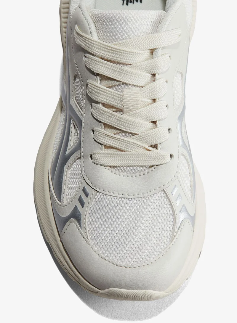 اتش اند ام حذاء رياضي