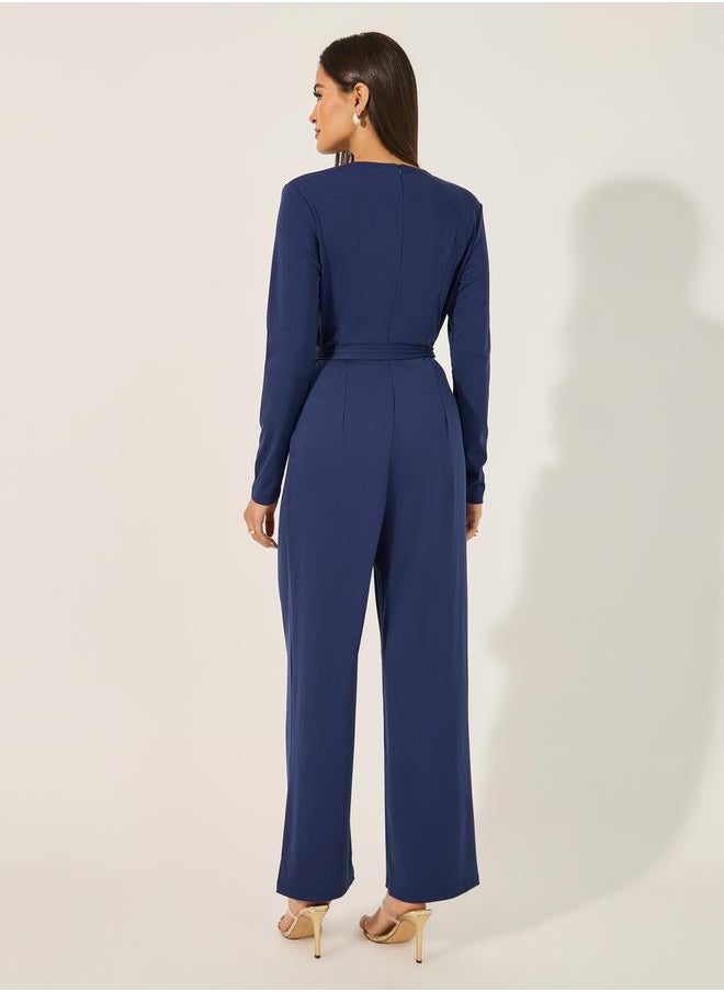 V neck Long sleeve jumpsuit in stretchy fabric with tie belt at waist - pzsku/ZDE3800E8E6A766AB3CA5Z/45/1741119985/dcb1083d-a9d3-4b12-b348-b475cc7e51d0