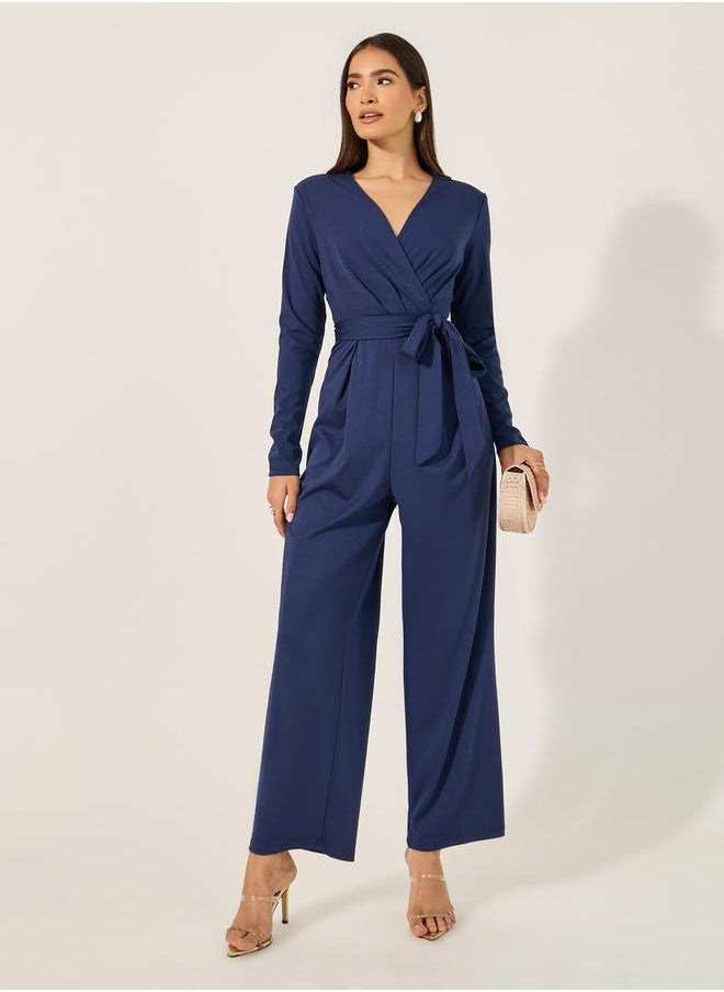 Styli V neck Long sleeve jumpsuit in stretchy fabric with tie belt at waist  - Image 1