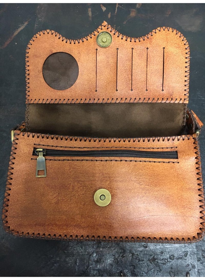 🎒 Handmade Genuine Leather Crossbody Bag – Your Everyday Essential 100% genuine leather, handmade with care 3 zippered compartments + card holders Soft velvet inner lining for a premium feel Comfortable handle & adjustable crossbody strap Size: 18×22 cm – ideal for everyday errands and outings 🛍️ Available now on Noon  Leather that works with your lifestyle  - Image 2