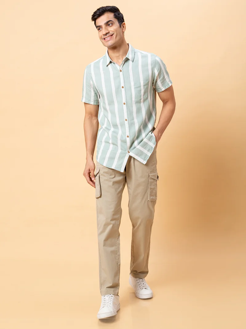 جلو باص جلوبس بنطلون كارجو رجالي بيج سادة بقصة ضيقة