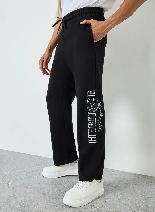Men Black Heritage Graphic Print Joggers