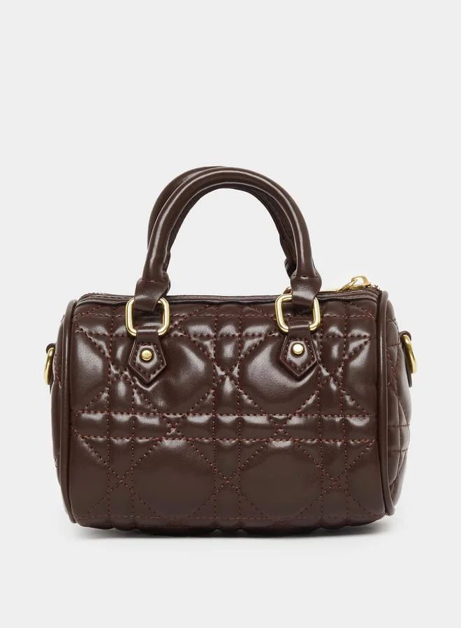 ستايلي شنطة ساتشيل مبطنة بتفاصيل وشاح