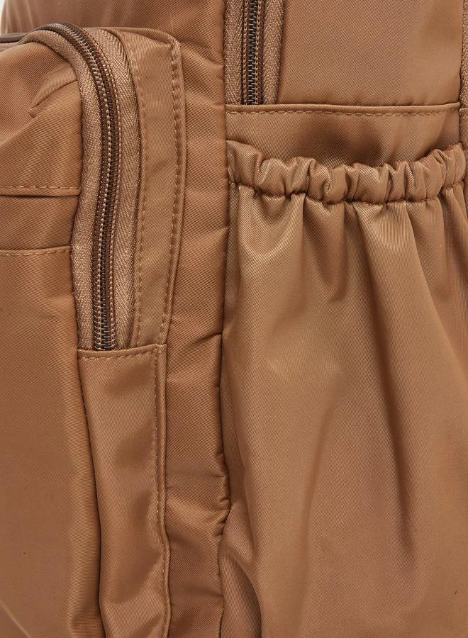 ستايلي حقيبة ظهر Styli بتفاصيل لاصقة وجيوب خارجية