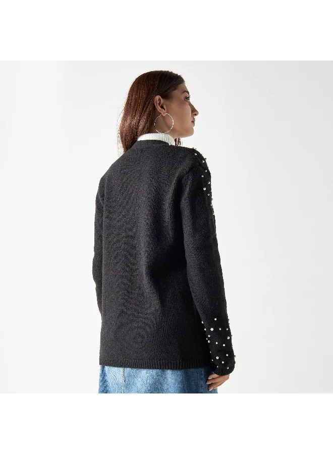 2Xtremz 2Xtremz All-Over Pearls Embellished Shrug with Long Sleeves and Pockets