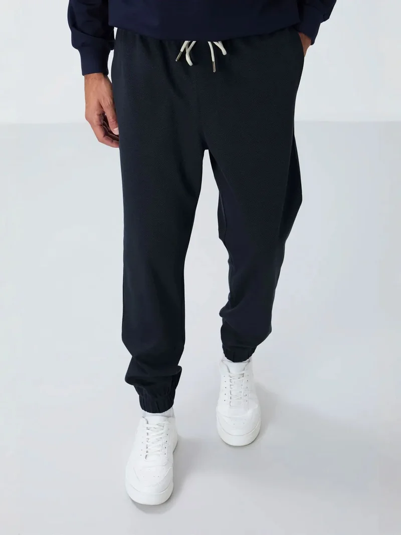 تومي لايف TOMMY Men's Regular Fit Fleece Sweatpants