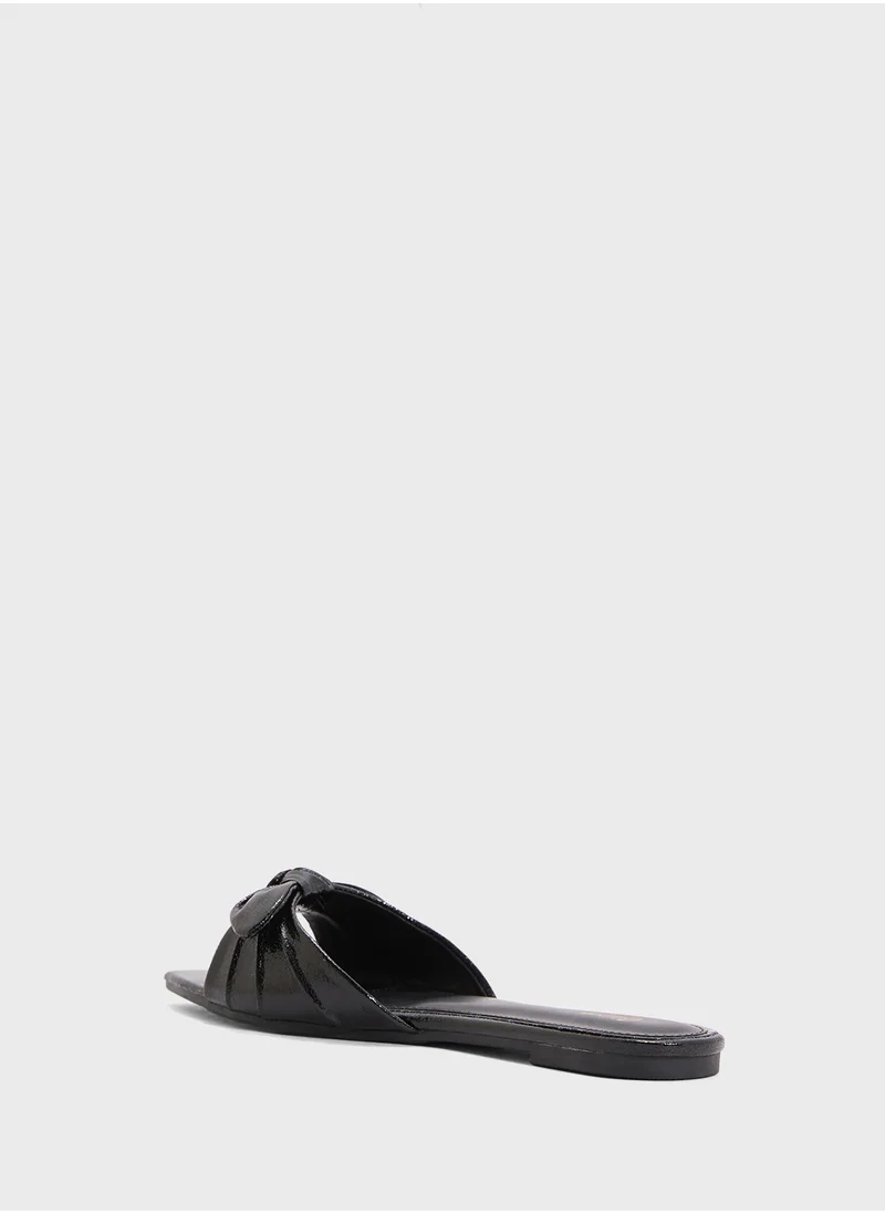 Ginger Pointed Flat Sandal With Bow