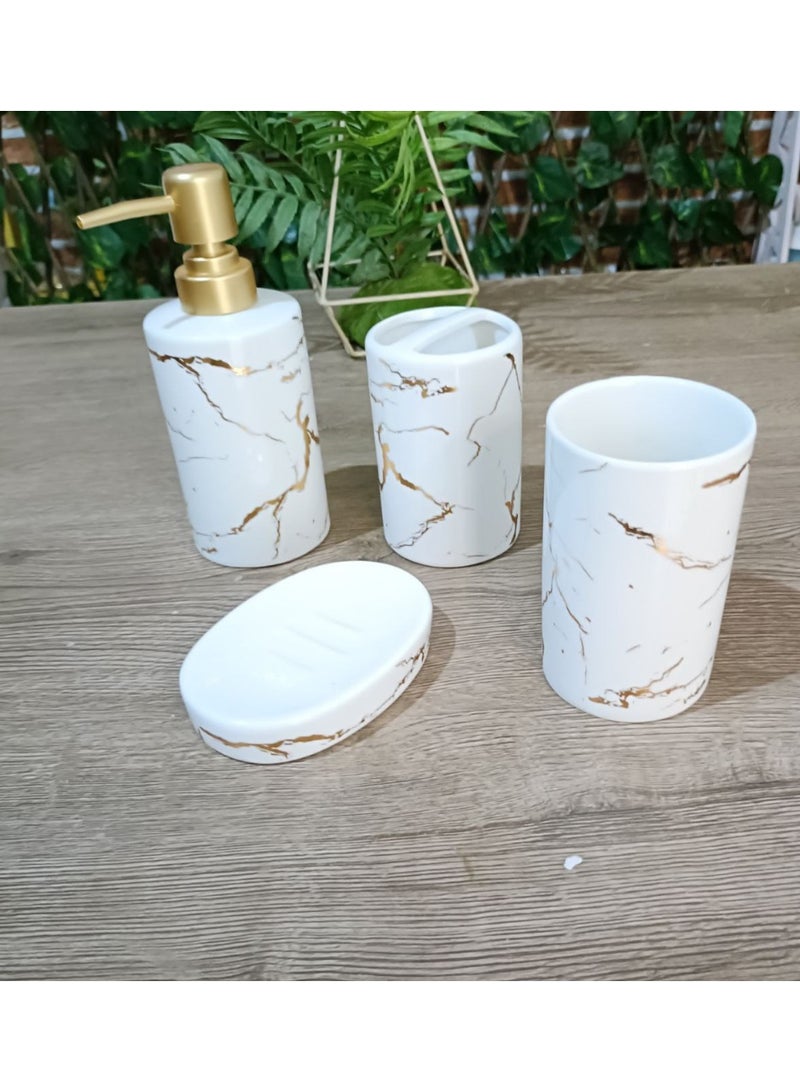 مجموعة إكسسوارات حمام من البورسلين مكونة من 4 قطع: موزع صابون، كوب، حامل فرشاة أسنان، طبق صابون - Image 1