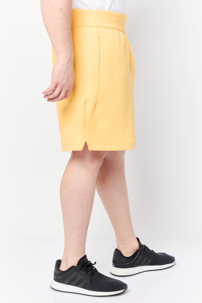Adidas شورتات رياضية للرجال بشعار العلامة التجارية، أصفر - Image 3