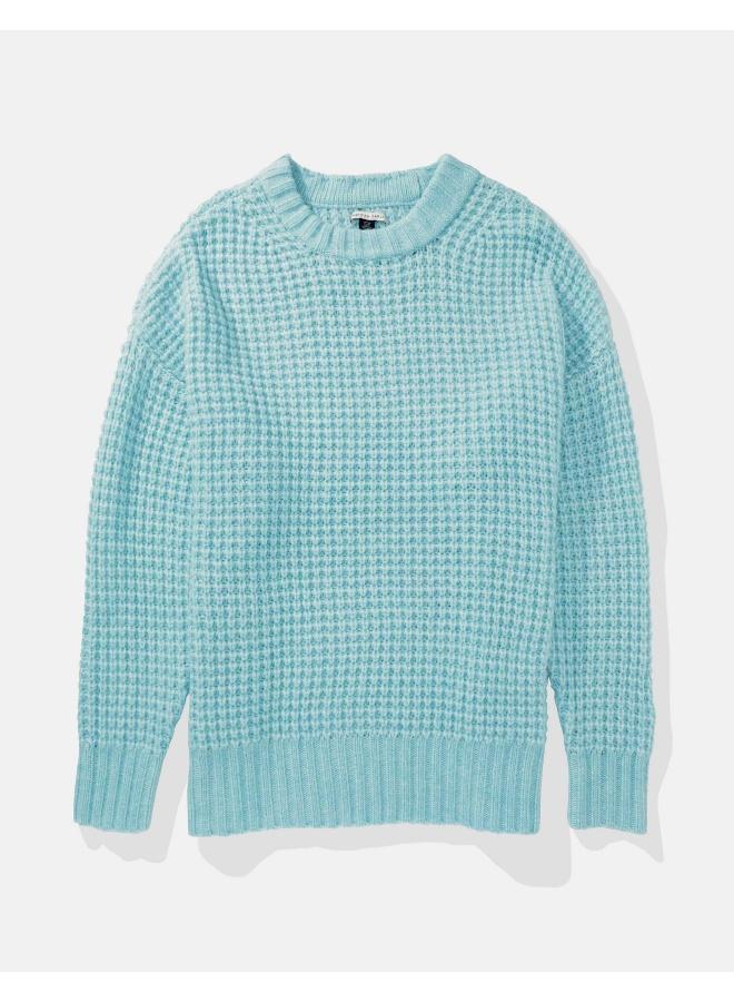 كنزة صوفية واسعة بياقة دائرية بنقشة الوافل