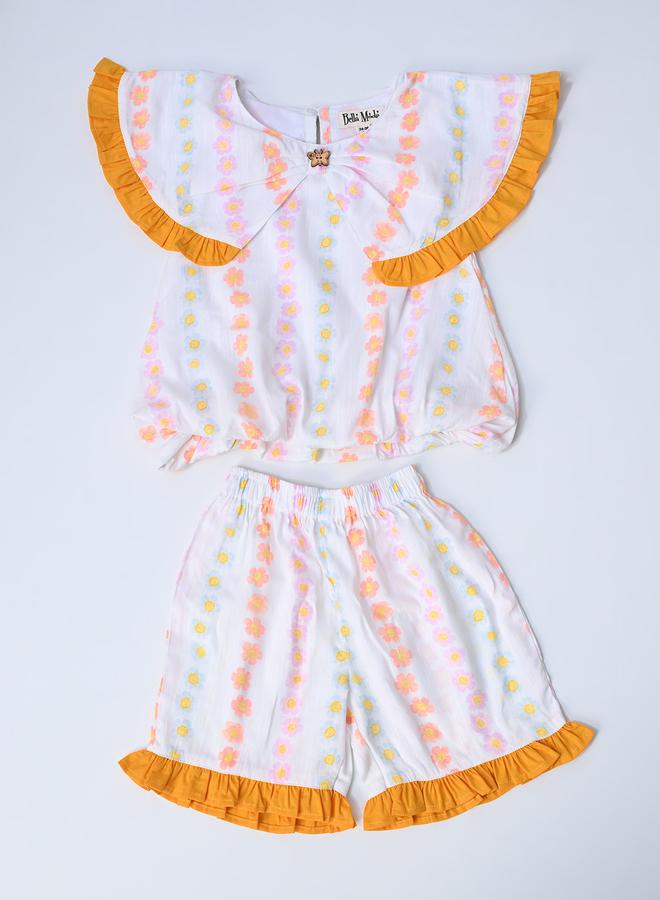 بيلا مودا طقم بلوزة بدون أكمام وشورت بطبعات وتفاصيل مكشكشة من بيلا مودا - Image 2