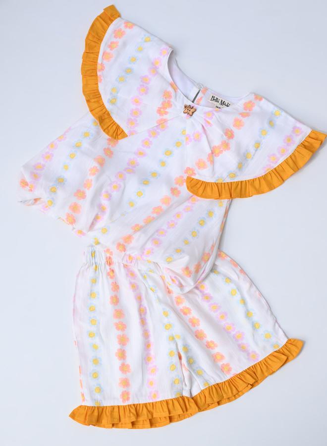 بيلا مودا طقم بلوزة بدون أكمام وشورت بطبعات وتفاصيل مكشكشة من بيلا مودا - Image 5