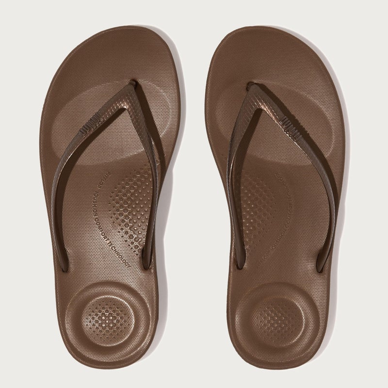 FitFlop Women's iQushion Rubber Flip-Flips with Contoured Footbed for Walking, Lightweight Ergonomic Flip Flop Sandals with Arch Support and Foot Impact Pillows, Bronze, 9 US Women - Image 2
