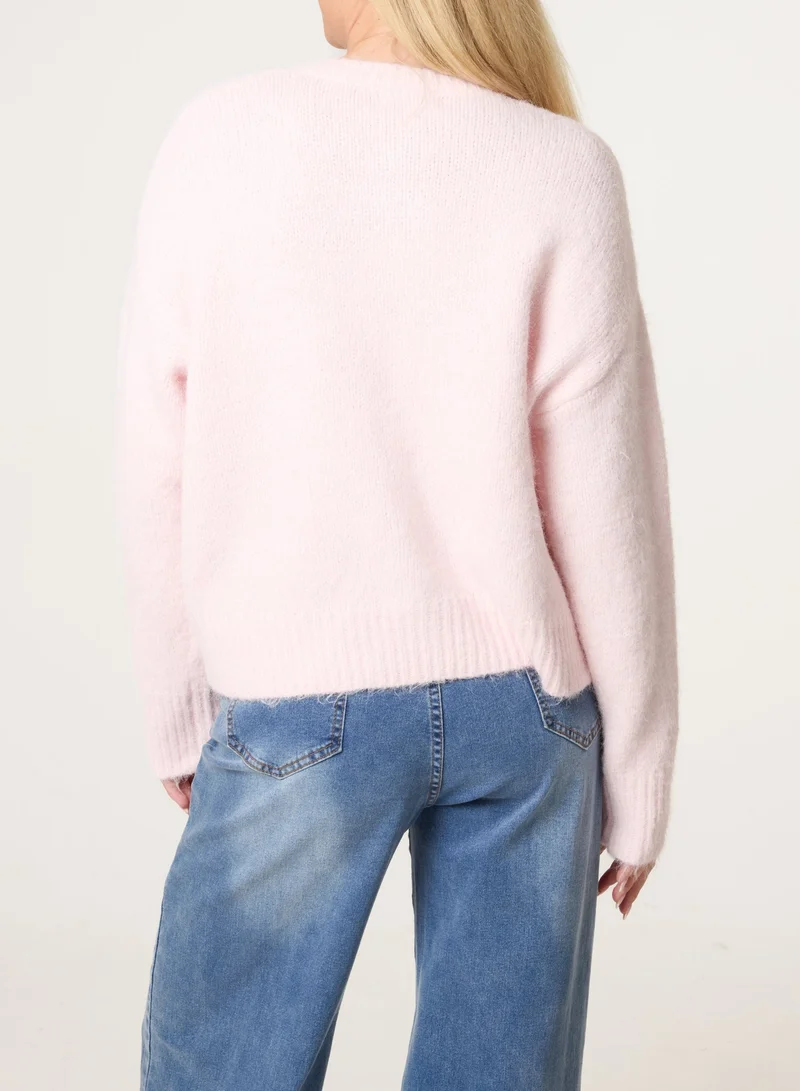 بلو فانيلا كارديجان بأزرار ذهبية متعددة