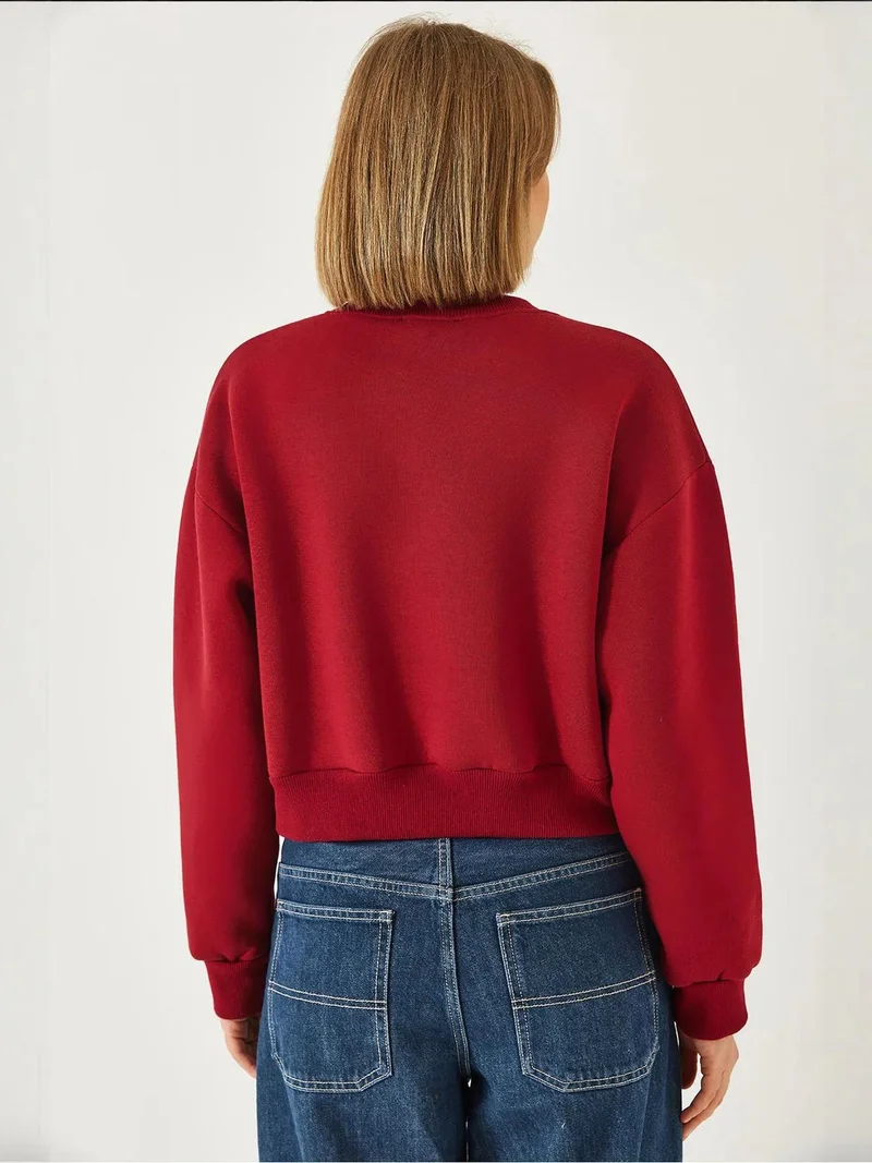 بيانكو لوتشي بلوفر بياقة دائرية بنقشة لوتشي مع بوم بوم