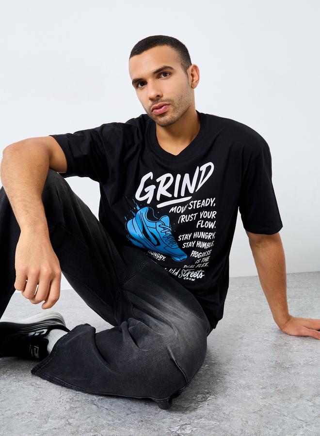 Styli Men Black Oversized Graphic Print Jersey T-Shirt - Image 1