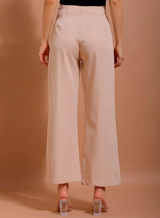 مرفوعة Women Flared Solid Mid-Rise Pants