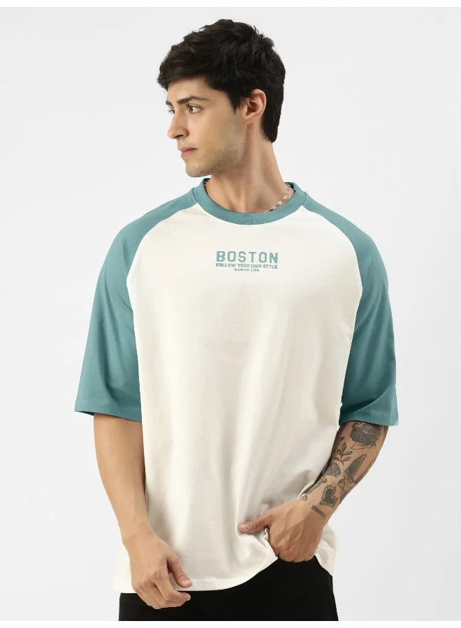 مانياك تيشيرت رجالي قطن أوفرديزد بطبعة، أبيض وأزرق تركي، بياقة دائرية وأكمام راجلان 3/4