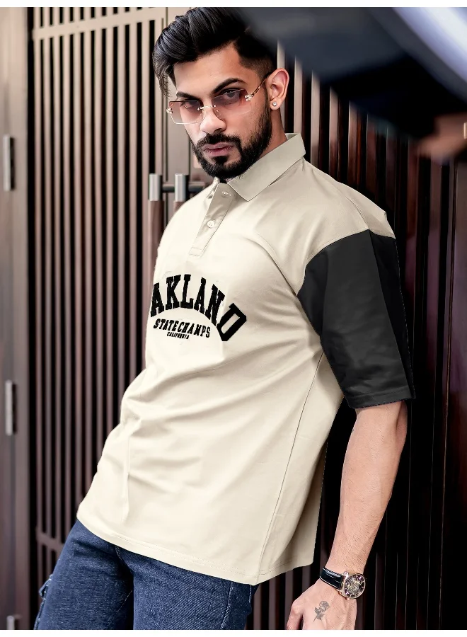 مانياك تيشيرت مانياك رجالي قطن أوفرسايز بطبعة وياقة بولو وأكمام 3/4 لون بيج
