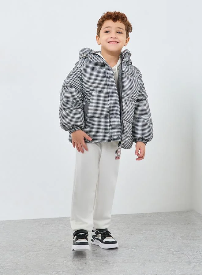 ستايلي جاكيت بفرو داخلي بنقشة مربعات وغطاء رأس