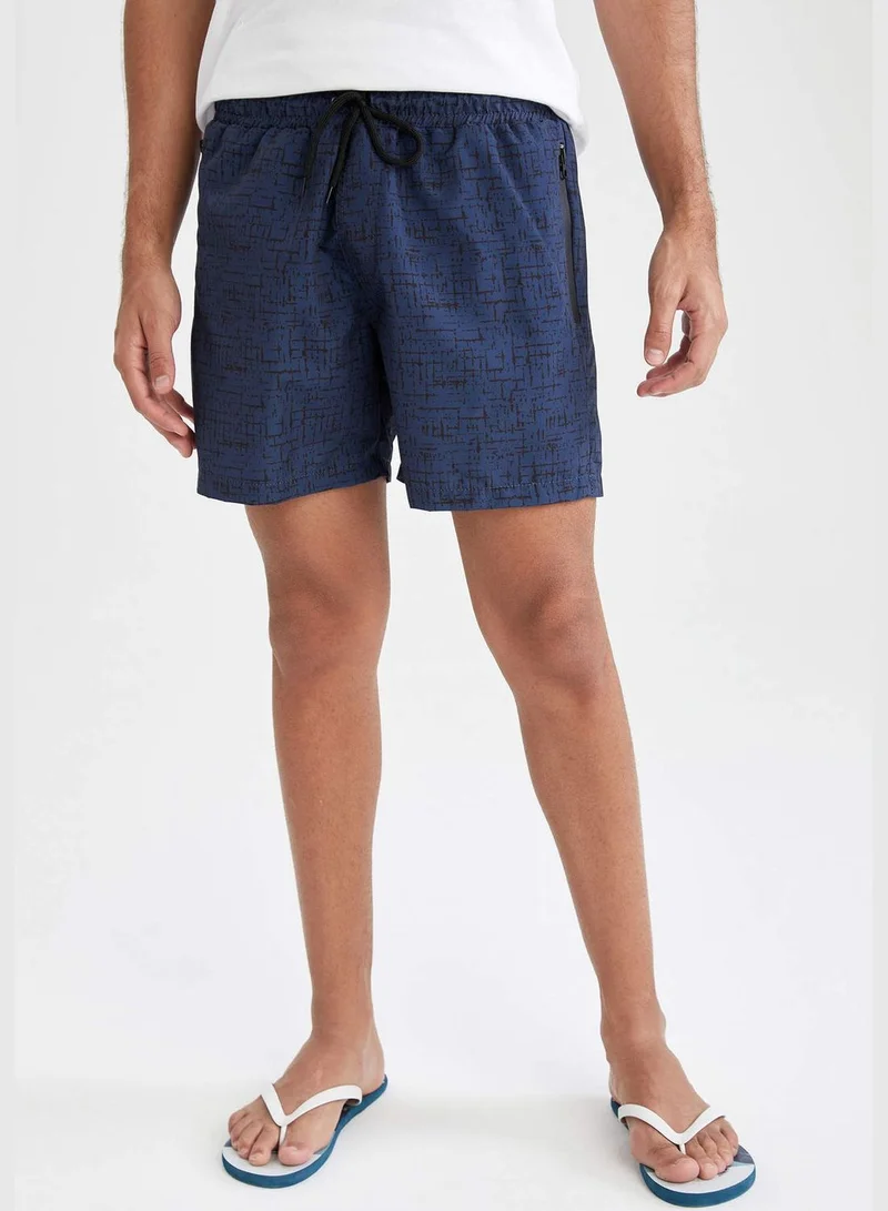 ديفاكتو Patterned Drawstring Above Knee Swim Shorts