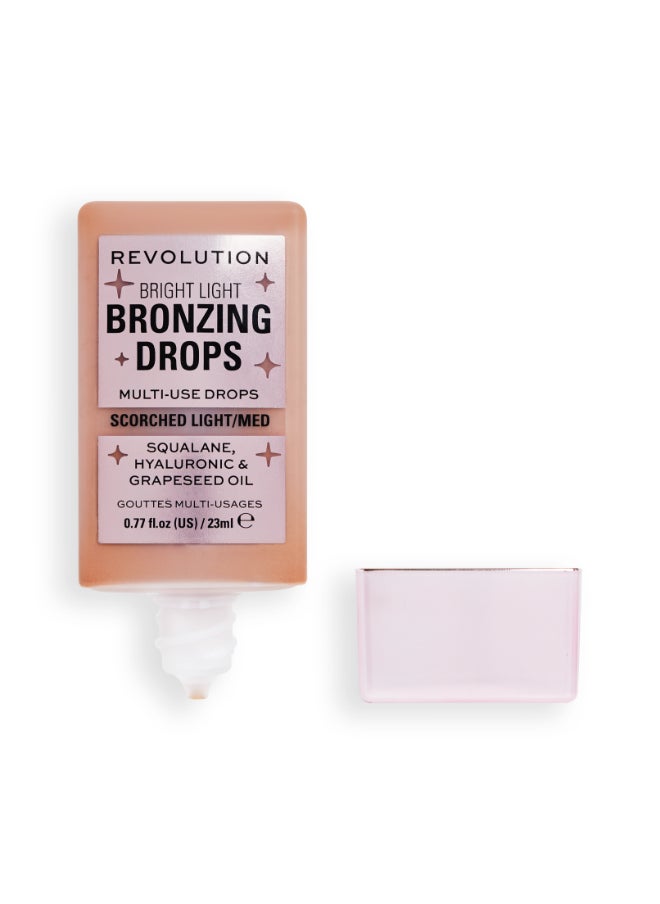 REVOLUTION - Bright Light Bronzing Drops Bronze Scorched - Image 1