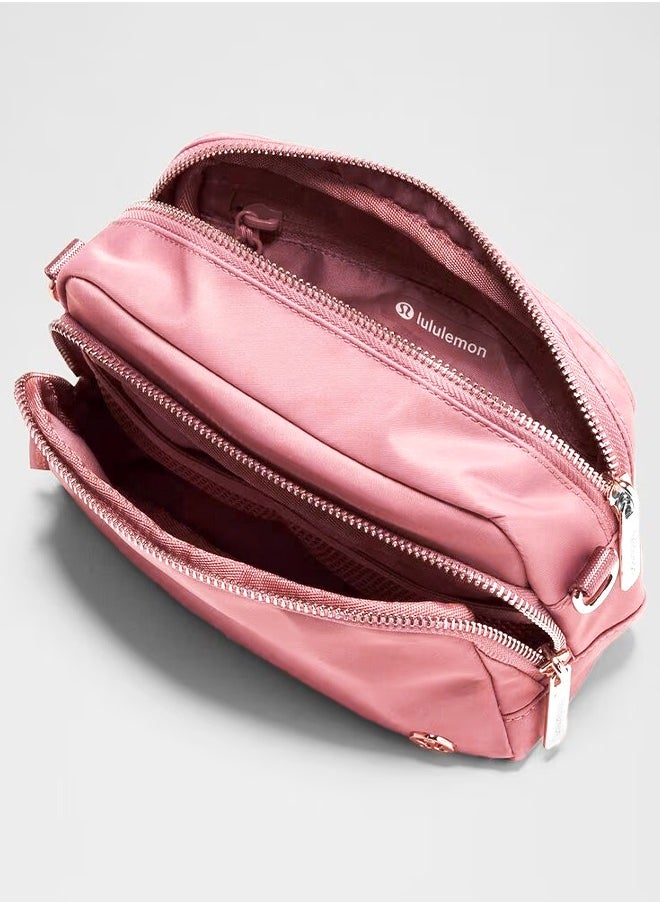 Lululemon - Everywhere Crossbody Bag – Compact and Convenient Belly Bag with Zippered Pockets, Easy-Access Exterior Pocket, and Interior Essentials Pocket for On-the-Go Storage, Pink - Image 1