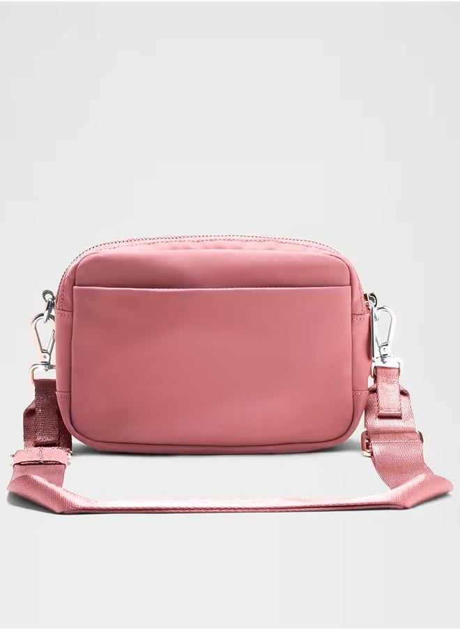 Lululemon - Everywhere Crossbody Bag – Compact and Convenient Belly Bag with Zippered Pockets, Easy-Access Exterior Pocket, and Interior Essentials Pocket for On-the-Go Storage, Pink - Image 1