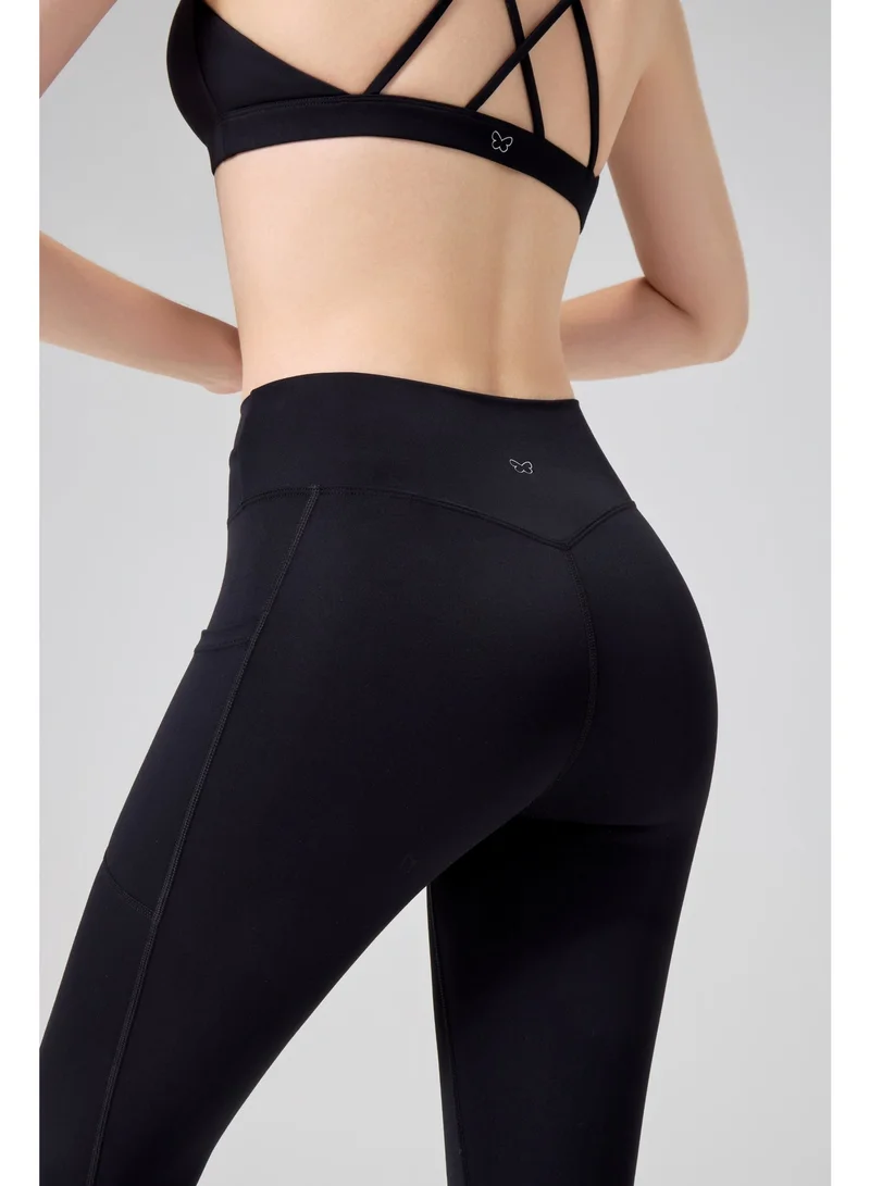 أﻣورﻛس بنطال اليوغا النسائي عالي الخصر من AMORXE - تصميم ملتوي، تحكم في البطن، جيوب جانبية، سروال يوجا مطاطي لتدريبات الجري واللياقة البدنية، مقاس كبير أسود