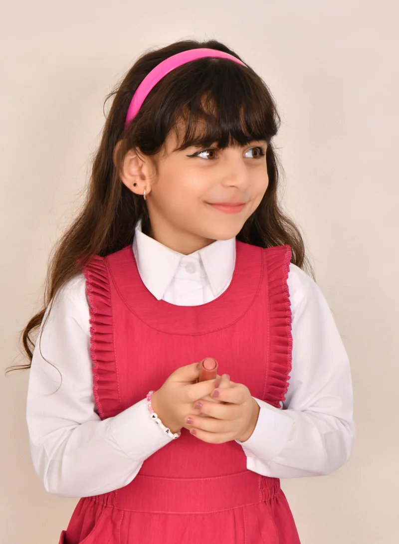 HAWRAA ABAYA Fuchsia apron with elegant ruffles and elasticated sides - Primary