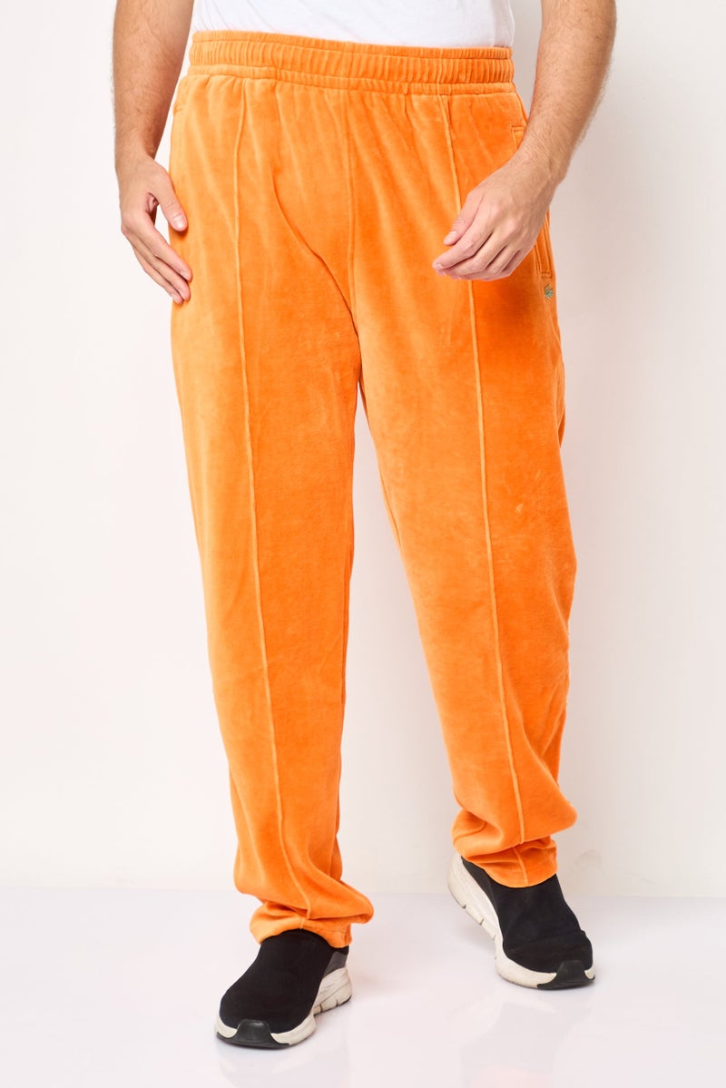 LACOSTE Men Regular Fit Ribbed Stretchable Wide Leg Pants, Orange - Image 1